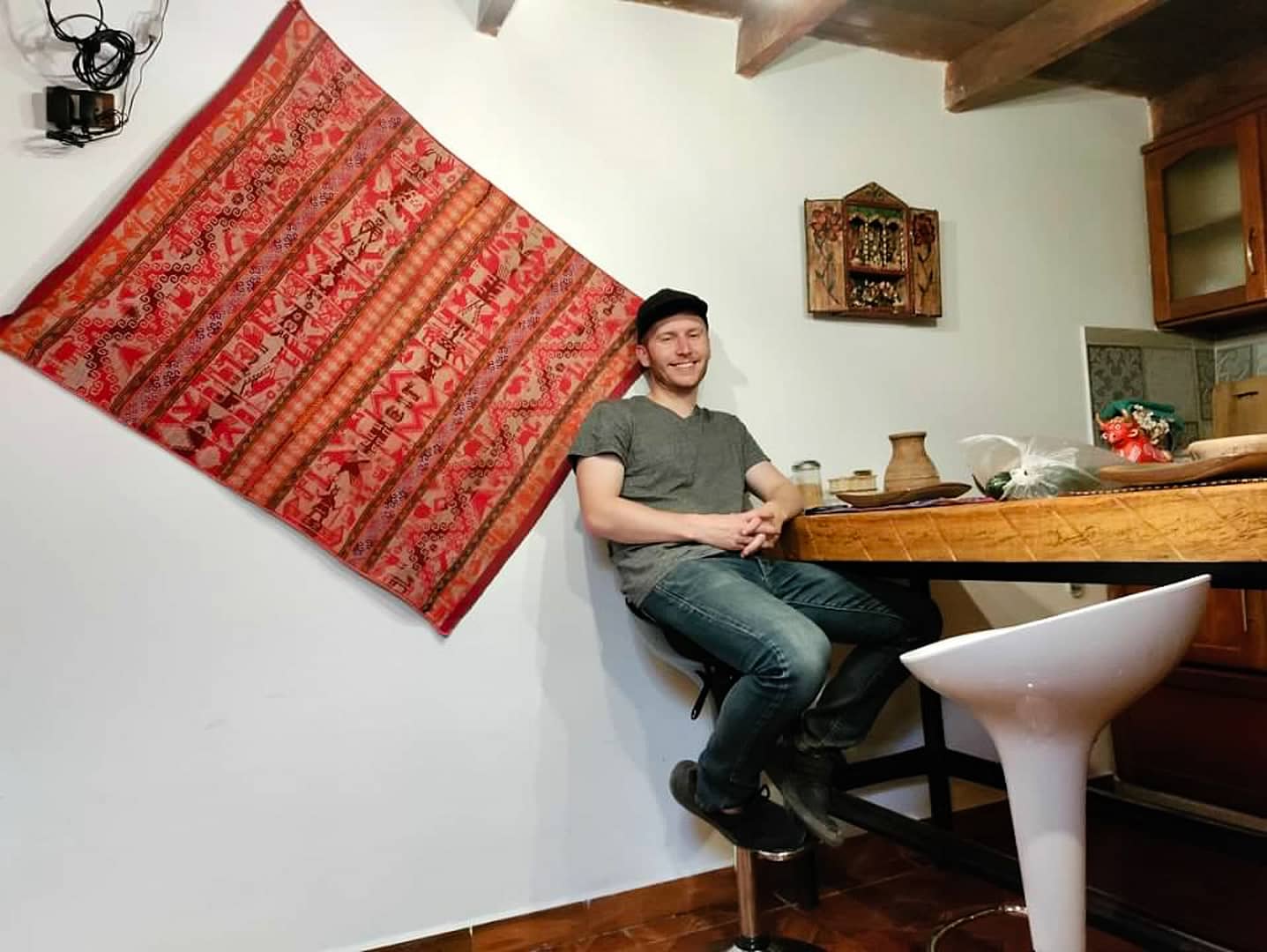 Man sitting at the countertop at an Airbnb